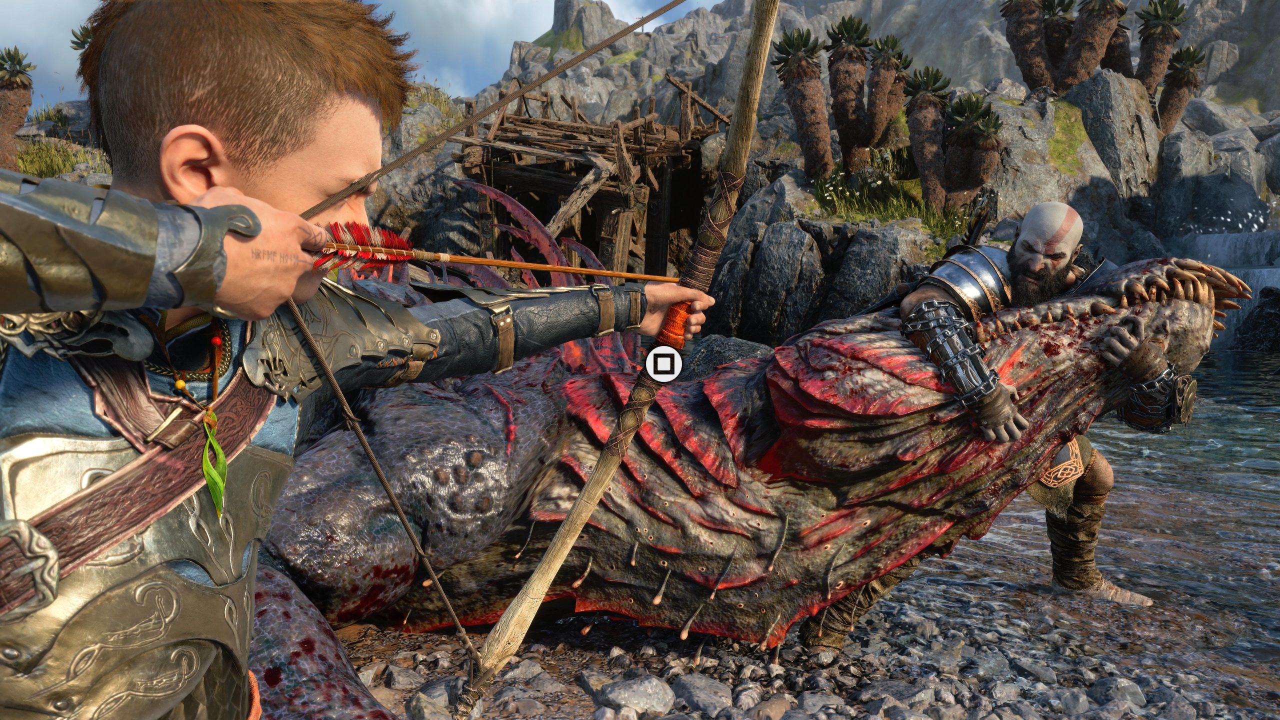 Kratos és Atreus kicsinál egy nagy krokodil lényt